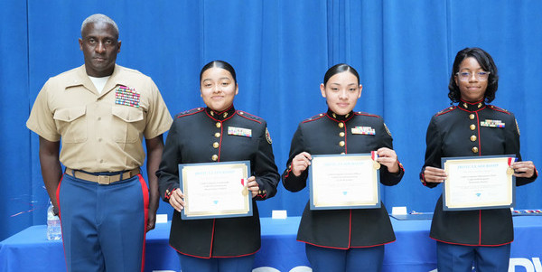 Marine JROTC students with awards
