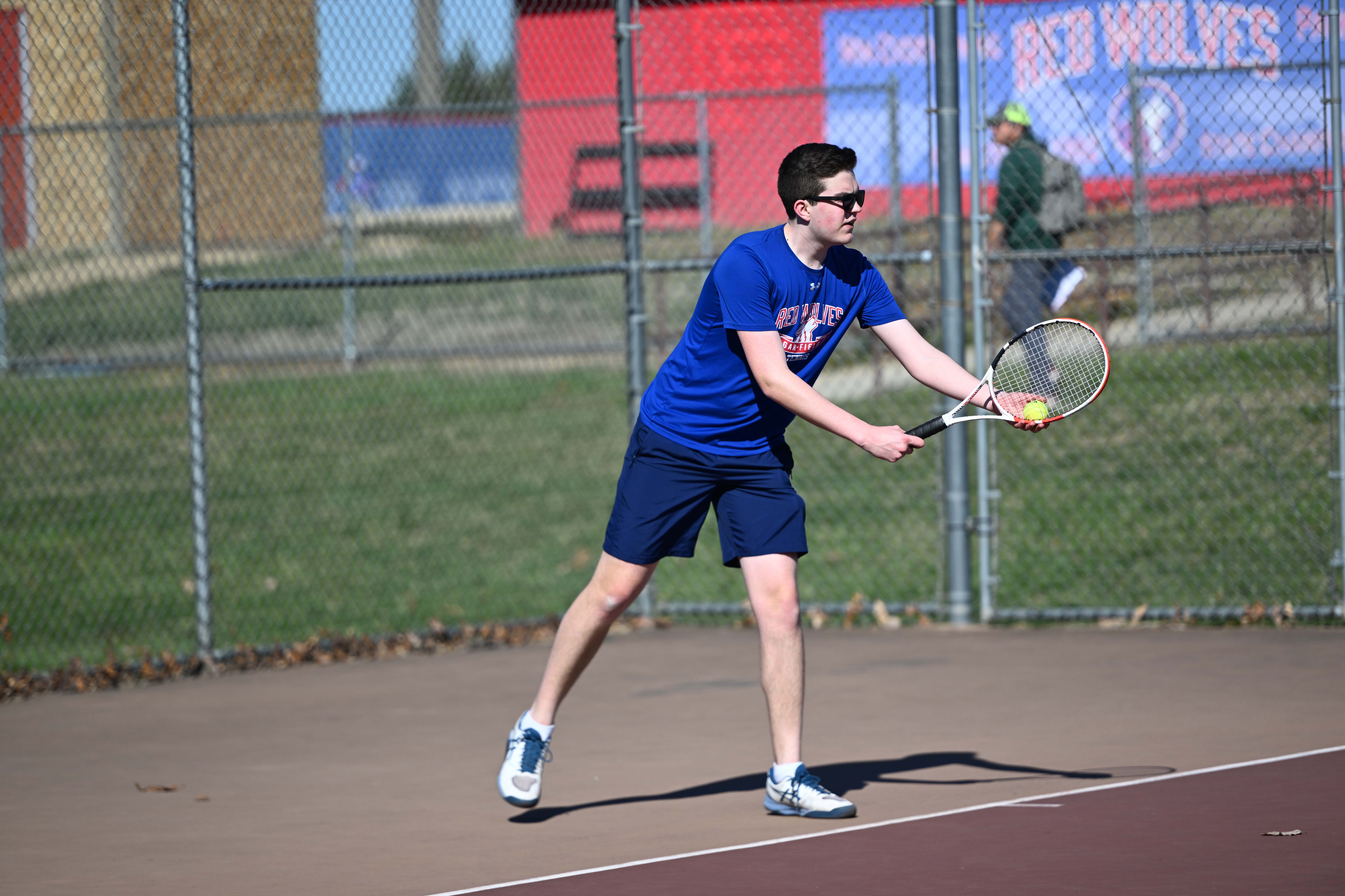 Male Tennis Player serving